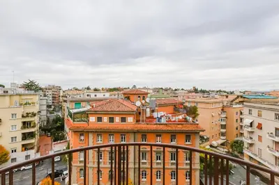 a view of the city from the balcony of a building at BDC - Stairway to Heaven in Rome