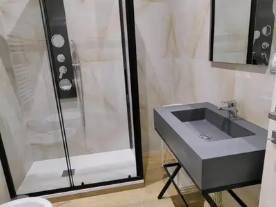a bathroom with a sink and a shower at B&B Gregorio VII in Rome