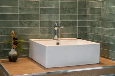 a white sink on a counter in a bathroom at Penthouse Vado Collection in Rome