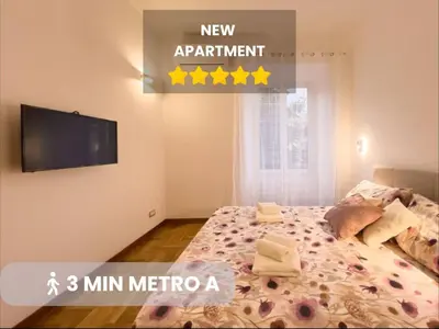 a bedroom with a bed with five stars on it at Braliu Apartment in Rome
