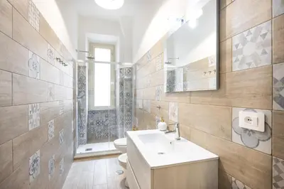 a bathroom with a sink and a toilet at Casa Minieri - Viale Mazzini - San Pietro in Rome
