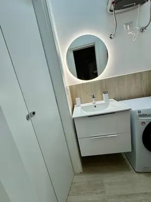 a bathroom with a sink and a mirror at Domus Romana Prati in Rome