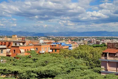 a view of a city with buildings and trees at Monteverde Nuovo Penthouse in Rome