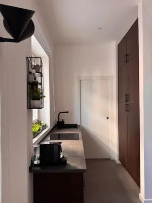 a kitchen with a sink and a counter top at LRV Apartment Roma Metro B Conca d'Oro in Rome