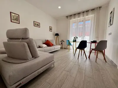 a living room with a couch and a table at Costabella Guest House in Rome