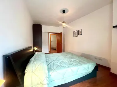 a bedroom with a large bed in a room at Gandino House at Vatican in Rome