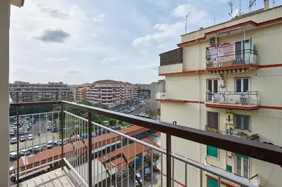 a view of a city from a balcony of a building at 15 minuti da San Giovanni - A c, Wifi e Smart Tv in Rome