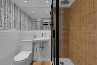 a bathroom with a toilet and a sink and a shower at ROME City Center Apartment III in Rome