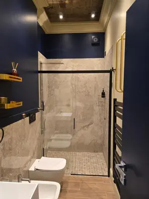 a bathroom with a shower with a toilet and a sink at Train Station in Rome