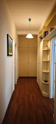 an empty room with a hallway with a closet at San Peter's Gates in Rome