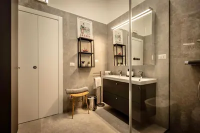 a bathroom with a sink and a mirror at Aradam Luxury Heritage in Rome