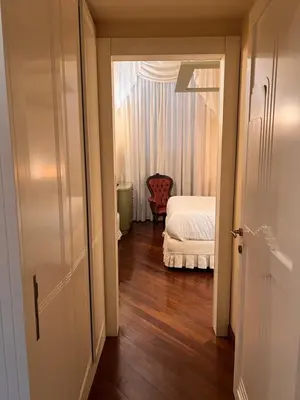 a room with a bedroom with a bed and a window at Residenza Lucullo in Rome