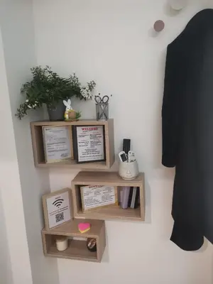 a room with two wooden shelves on a wall at Betterplace 2 in Rome