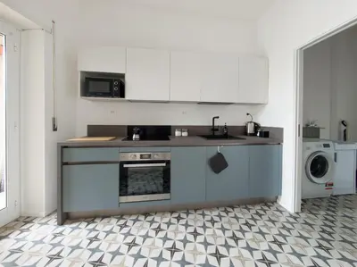 a kitchen with a sink and a stove at Casa Vista San Pietro in Rome