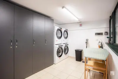 a laundry room with a washer and dryer at Luxury House in Roma Nicolo V 120 mq in Rome