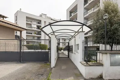 an entrance to a building with an iron gate at Primavera Home in Rome