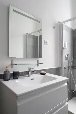 a bathroom with a white sink and a mirror at Angels Beauty House in Rome