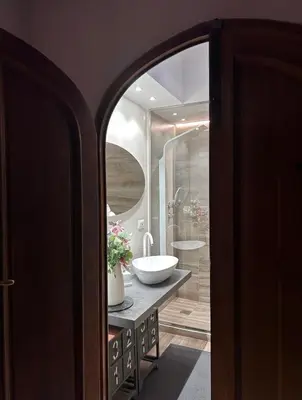 a bathroom with a sink and a mirror at Domus Angel's of Rome in Rome