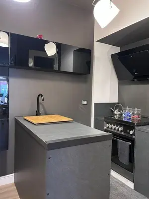 a kitchen with a counter top and a stove at Domus Angel's of Rome in Rome