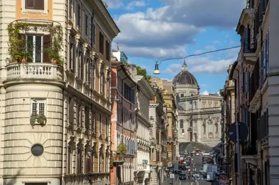 a street in a city with buildings at Liberti Colosseo - Luxury Apartment in Rome