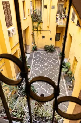 a view of an alley from a window at Style & Stone Guest House in Rome