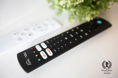 a remote control sitting on top of a wii controller at Dream House Re di Roma - 50mt to Metro Station, central position, 4pax, 2bdr in Rome