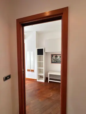 a door leading into a room with a bedroom at Vatican District, Roma, alloggio centrale in Rome