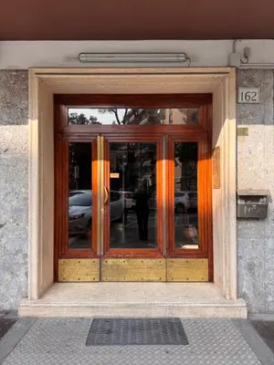 an entrance to a building with a revolving door at Vatican District, Roma, alloggio centrale in Rome