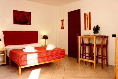 a bedroom with a bed with two towels on it at Appartamento con terrazza vicino al Vaticano in Rome