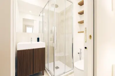 a bathroom with a sink and a shower at ​Easylife - Elegante trilocale in Piazza Navona in Rome