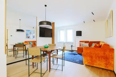 a living room with a table and a couch at ​Easylife - Elegante trilocale in Piazza Navona in Rome