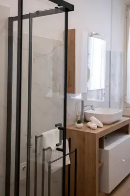 a bathroom with a shower and a sink at Appartamento Roma - Bredi Home in Rome