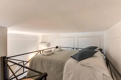 a bedroom with a bed in a room at Residenza Ripetta in Rome