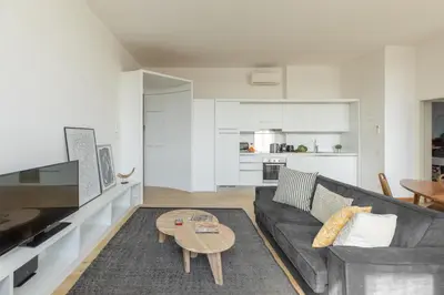 a living room with a couch and a table at iFlat Contemporary Elegant Skyline in Rome in Rome