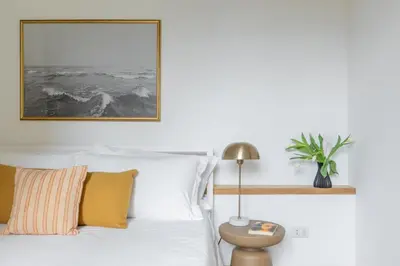 a bedroom with a bed and a picture on the wall at iFlat Contemporary Elegant Skyline in Rome in Rome