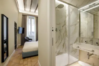 a bathroom with a shower and a sink at BeSecret Belsiana in Rome