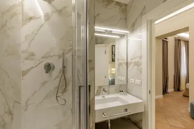 a bathroom with a sink and a shower at BeSecret Belsiana in Rome