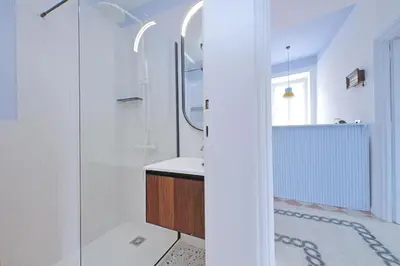 a bathroom with a shower and a sink at Modern retreat with Spectacular St Peter's views in Rome