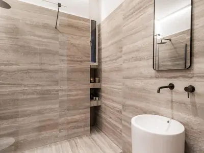 a bathroom with a sink and a shower at The Best Rent - Prestigious multi-bedroom apartment overlooking St. Peter’s in Rome