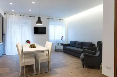a living room with a table and a couch at Boba's House, Rome in Rome