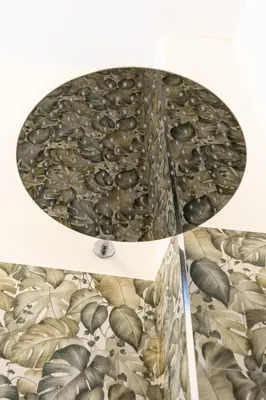 a glass table with a leaf pattern on it at Oasis house Trastevere in Rome