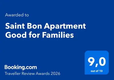 a blue sign with the words sat son appointment good for families at Saint Bon Apartment Good for Families in Rome
