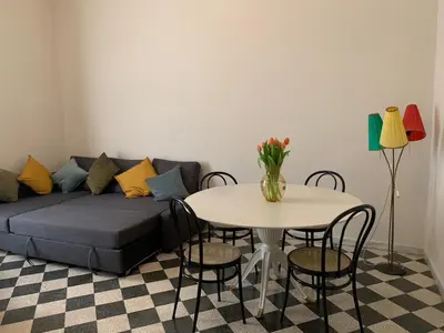a living room with a couch and a table at Santa Monica in Rome