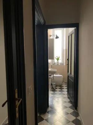 a bathroom with a toilet and a sink at Santa Monica in Rome