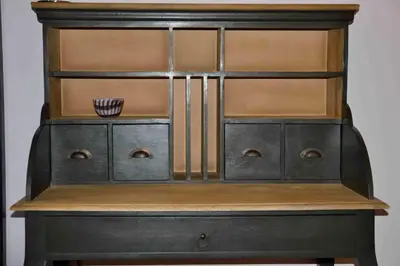 an old black cabinet with a wooden top at Trastevere elegant apartment in Rome