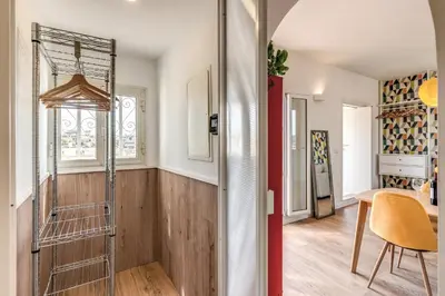 a room with a glass door leading to a dining room at Attic with terrace Spanish Steps exclusive in Rome
