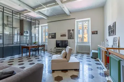 a living room with a couch and a table at iFlat Contemporary Design Living in Rome in Rome