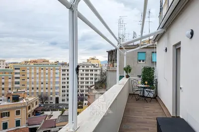 a balcony with a view of a city at Prestige Bellavista Apartment in Rome