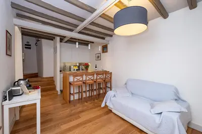 a living room with a couch and a table at Casa Di Armando al Pantheon in Rome