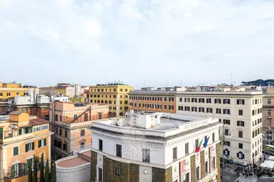 a view of a city skyline with buildings at New! Una Finestra su San Pietro in Rome